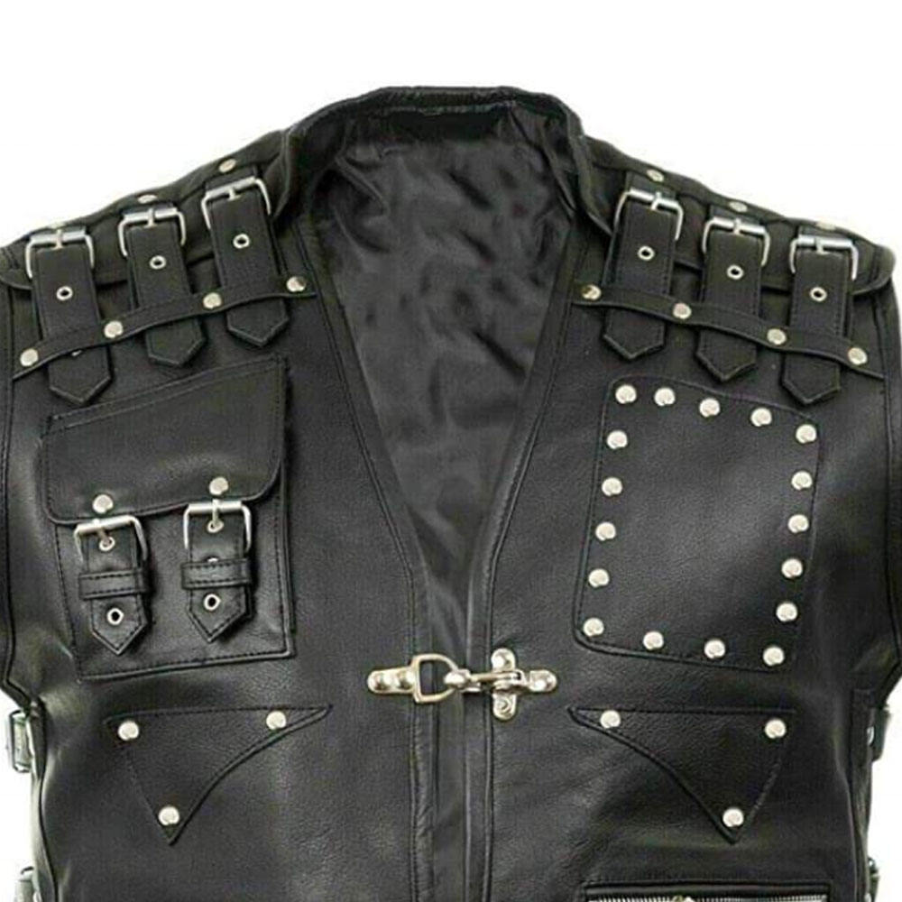 Black leather jacket with silver studs and buckles