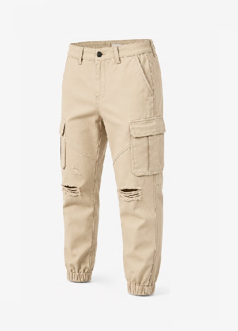Men's Stone Cotton Twill Ripped Cargo Jogger Trousers 3/4 front angle view showing cargo pockets and elasticated ankle cuff