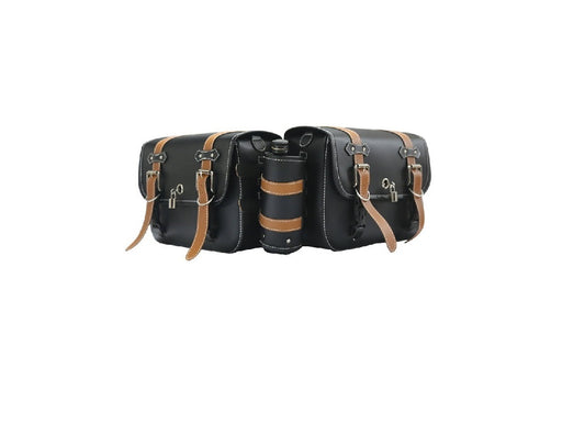 Two black leather saddlebags with brown straps on a white background