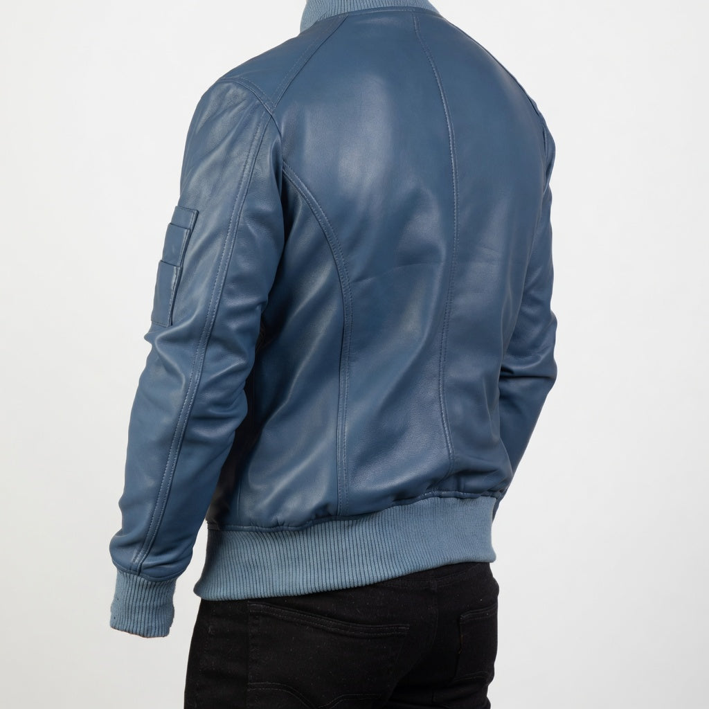Blue leather jacket worn by a person on a white background