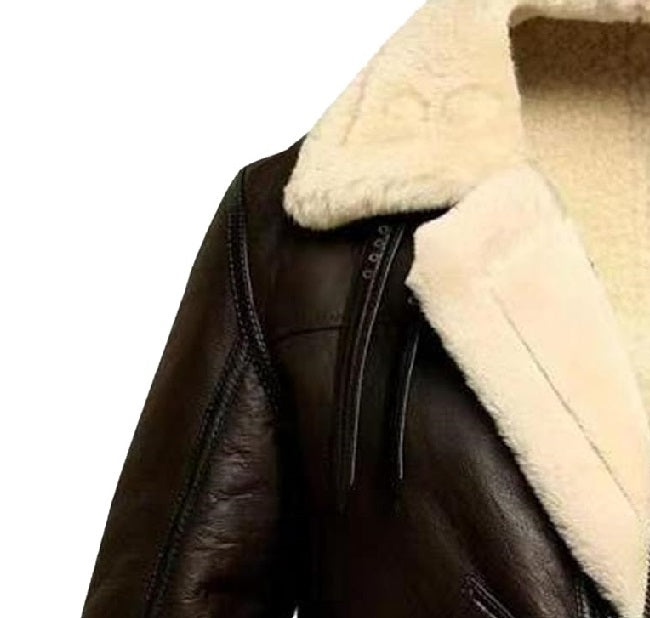 Close-up of a brown leather jacket with cream fur lining