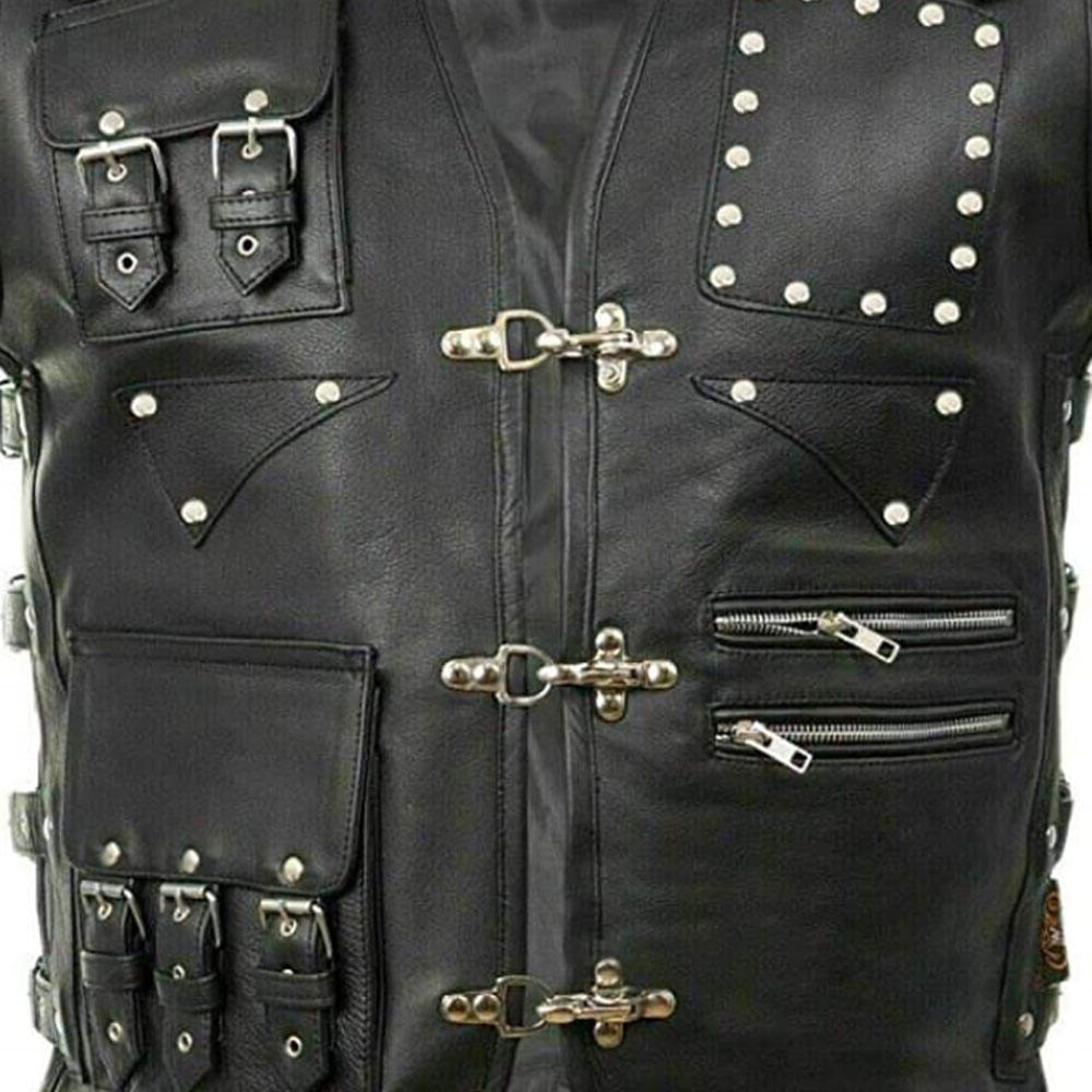 Black leather vest with silver studs, buckles, and zippers