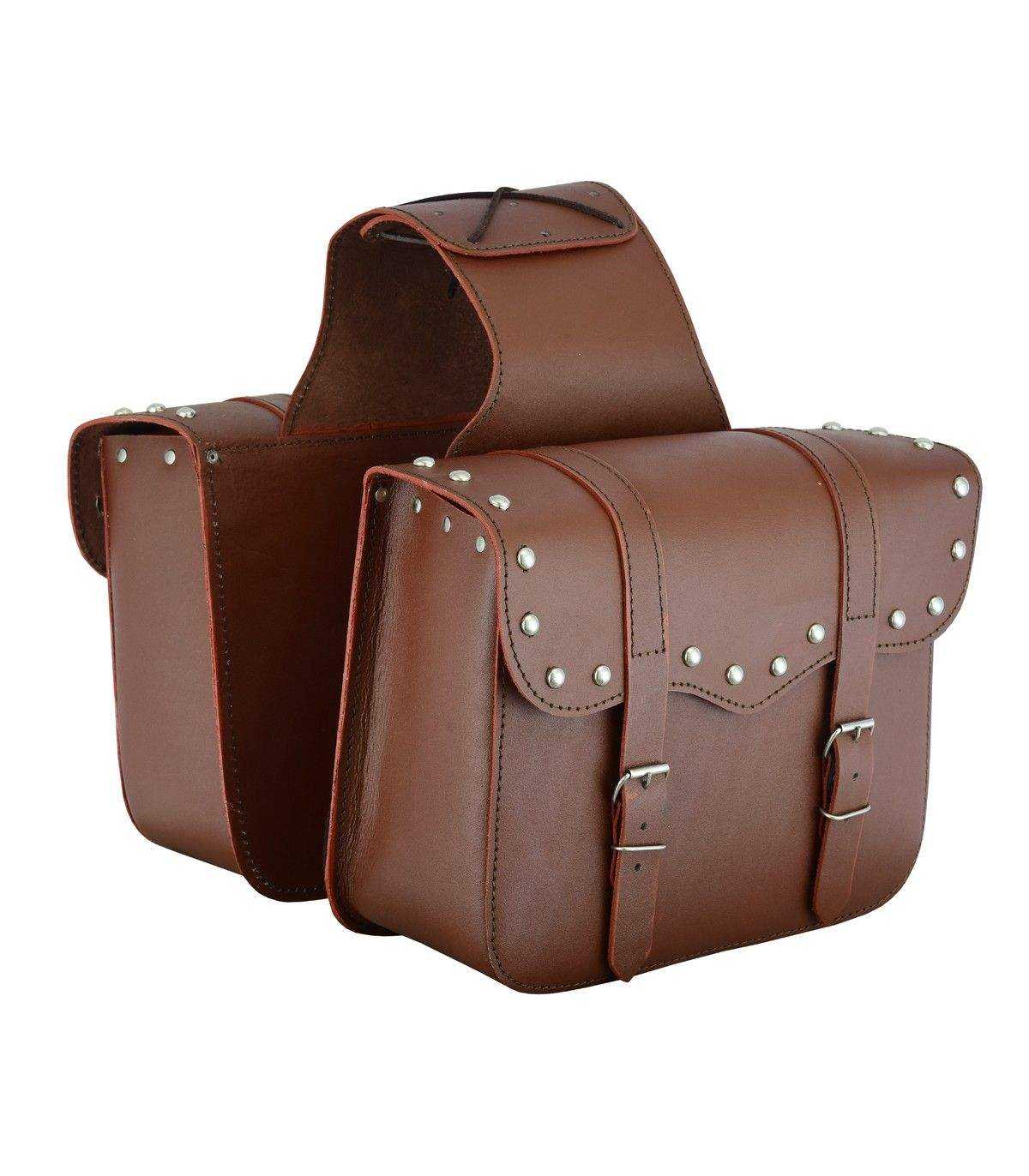 Pair of brown leather saddlebags with studs on a white background