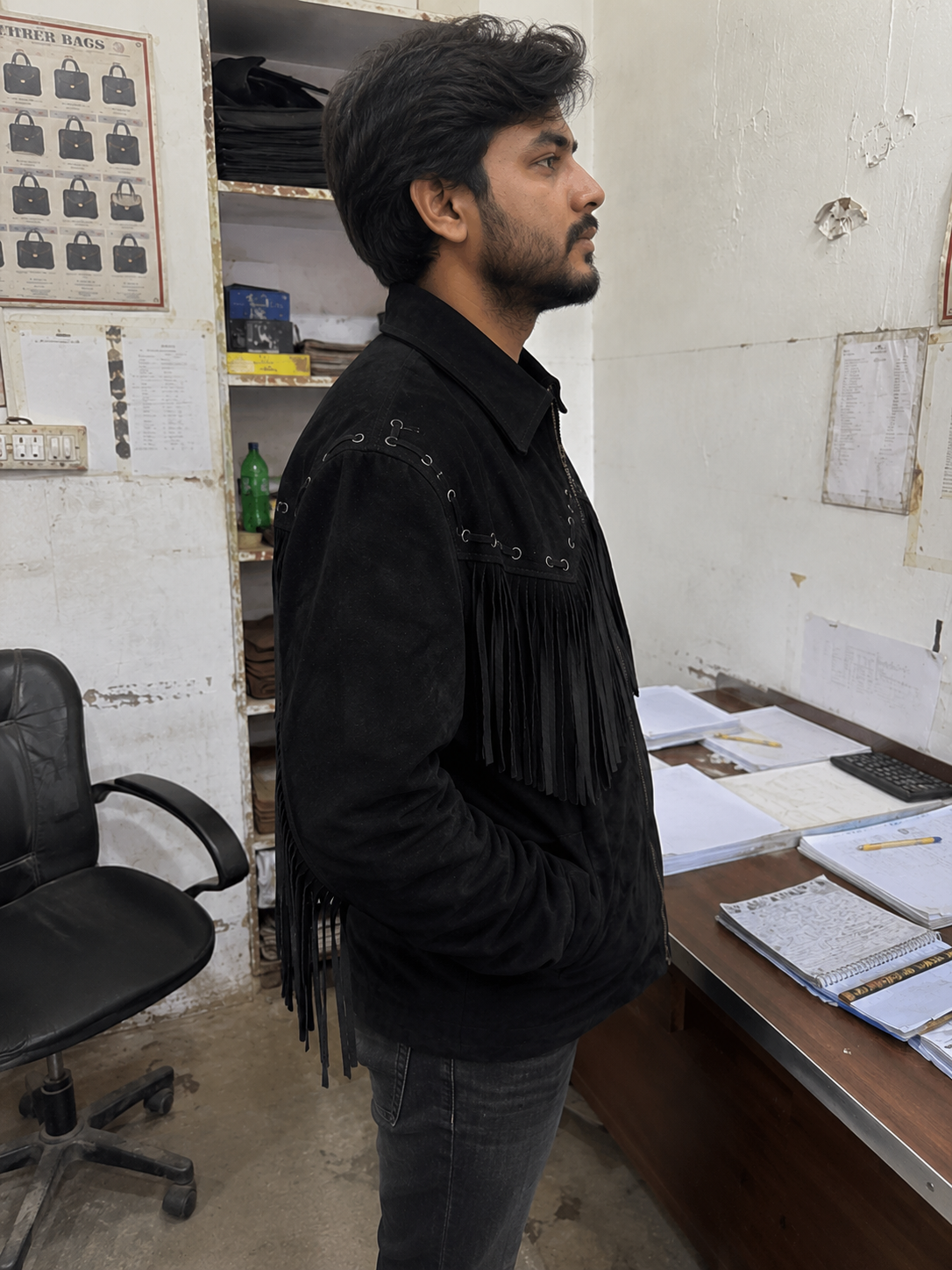 Men's Black Suede Fringe Jacket lifestyle shot showing western cowboy styling with dark jeans