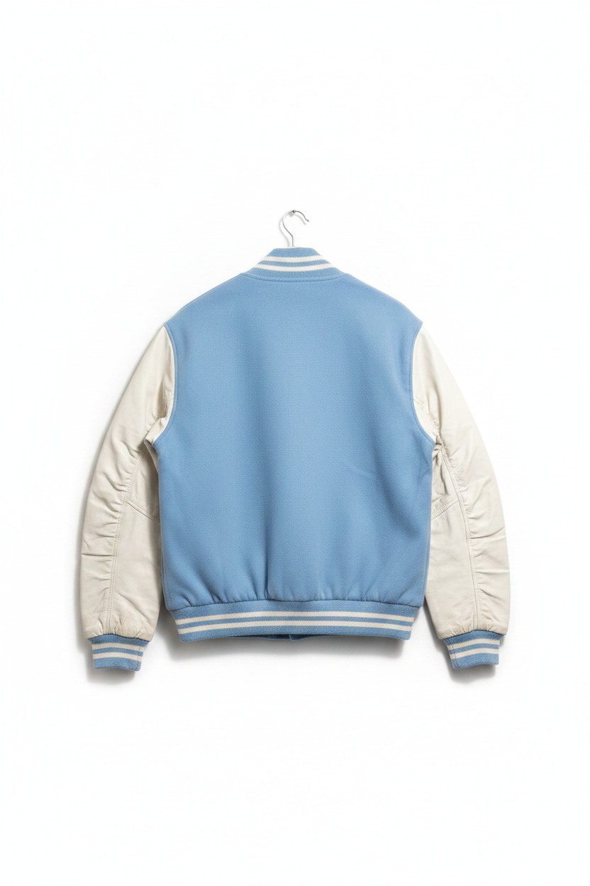 A light blue and cream varsity-style jacket shown from the back, hanging on a white hanger against a plain white background.