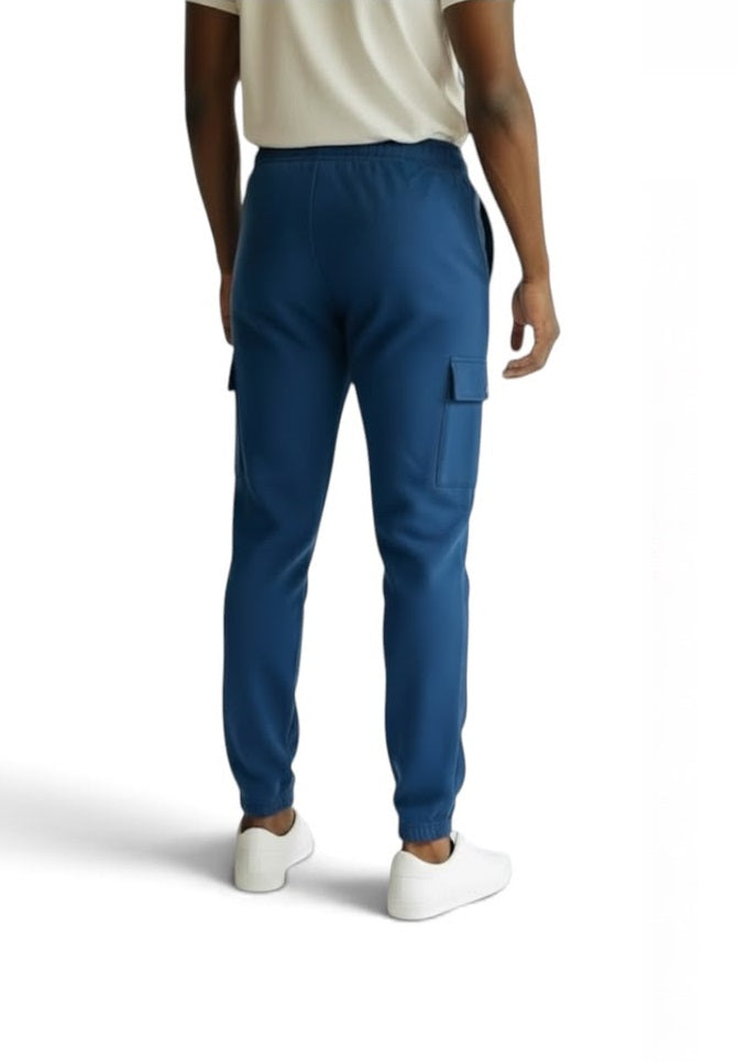 Front product view of blue fleece cargo joggers with zipped pockets