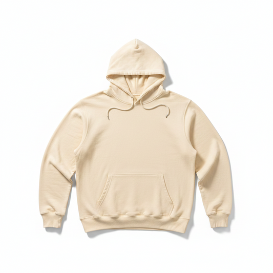 A light beige pullover hoodie with a front kangaroo pocket and matching drawstrings, laid flat on a white background.